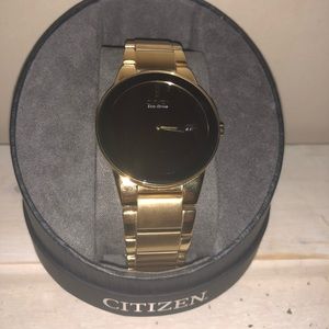 Men’s gold Citizen Eco-Drive watch